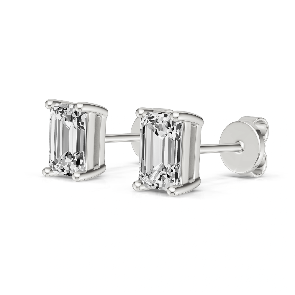 Silver-toned emerald-cut stud earrings shown from side with post backs