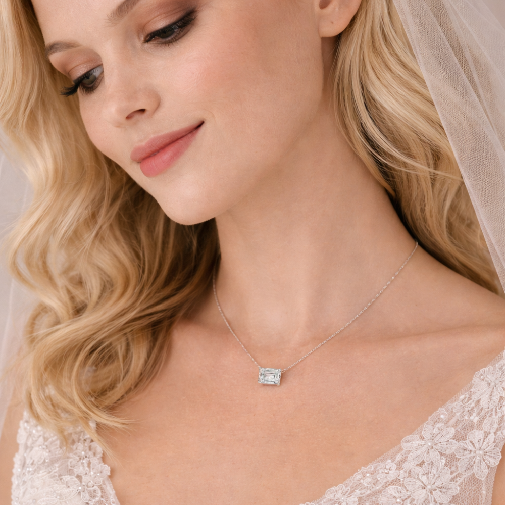 Emerald-cut pendant necklace with silver-tone chain and rectangular center stone