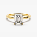 Gold vermeil emerald-cut solitaire ring with rectangular step-cut center stone, angled view