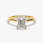 Gold vermeil emerald-cut solitaire ring with rectangular step-cut center stone, angled view