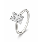 Silver-tone emerald-cut solitaire ring with four-corner prong setting