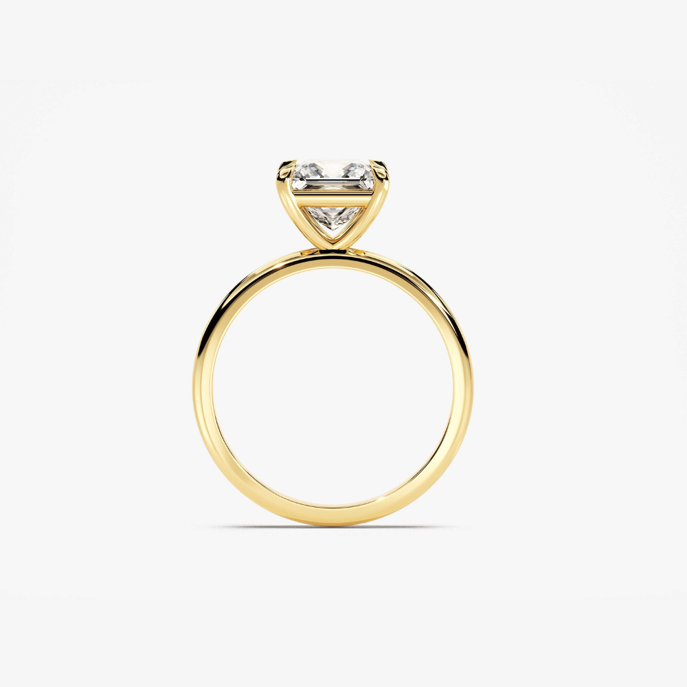 Gold vermeil solitaire ring side profile with rectangular emerald-cut center stone