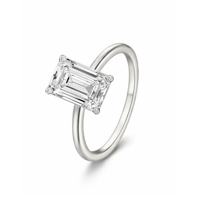 Silver-tone emerald-cut solitaire ring with four-corner prong setting