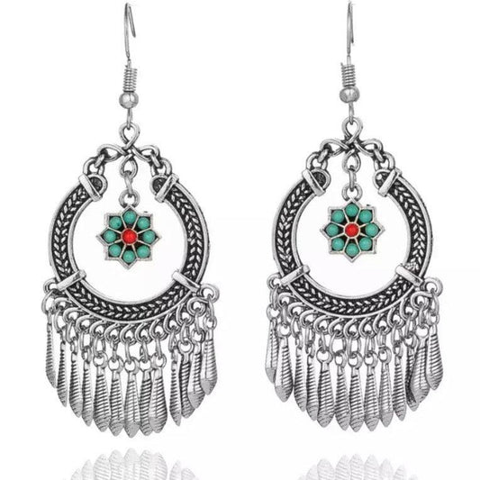 Silver-tone flower dangle earrings with hoop filigree and turquoise/red center tassels