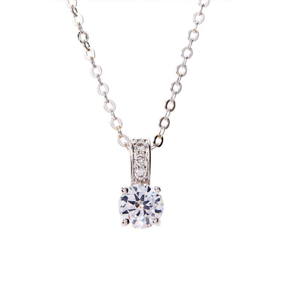 Cubic zirconia pendant necklace with round stone and vertical halo, silver-tone chain