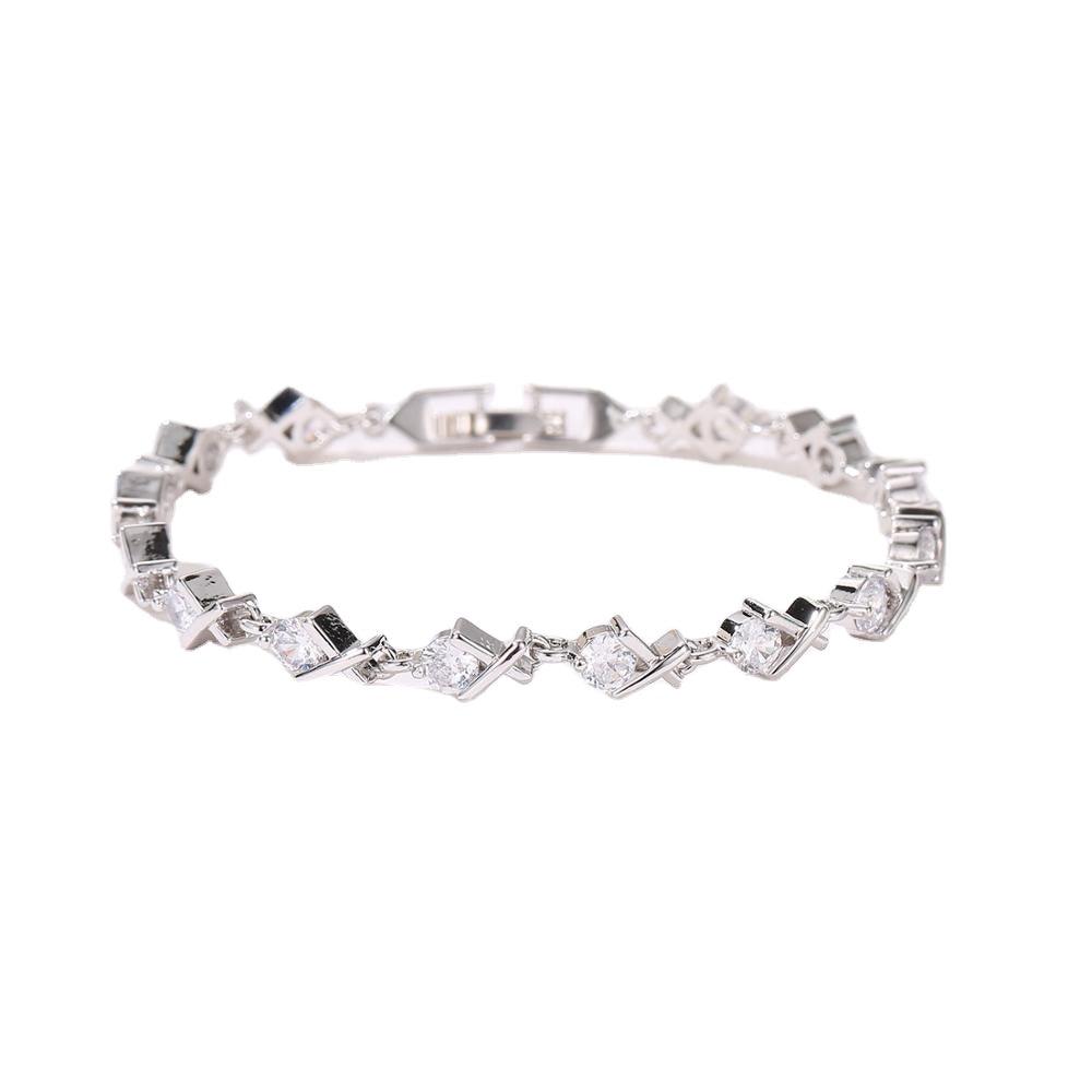 Silver-tone tennis bracelet with rectangular clear CZ stones