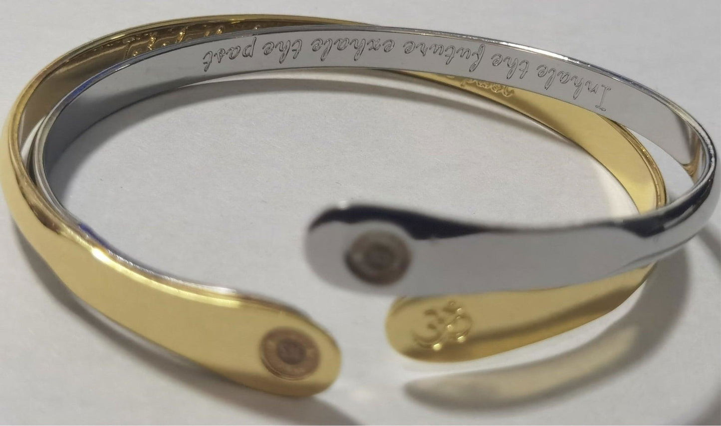 Two-tone metal yoga bracelet with Om engraving and round stamped discs