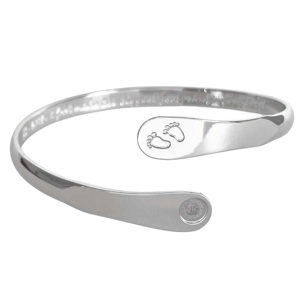 Silver baby footprint engraved bracelet featuring stamped feet motif and circular hallmark