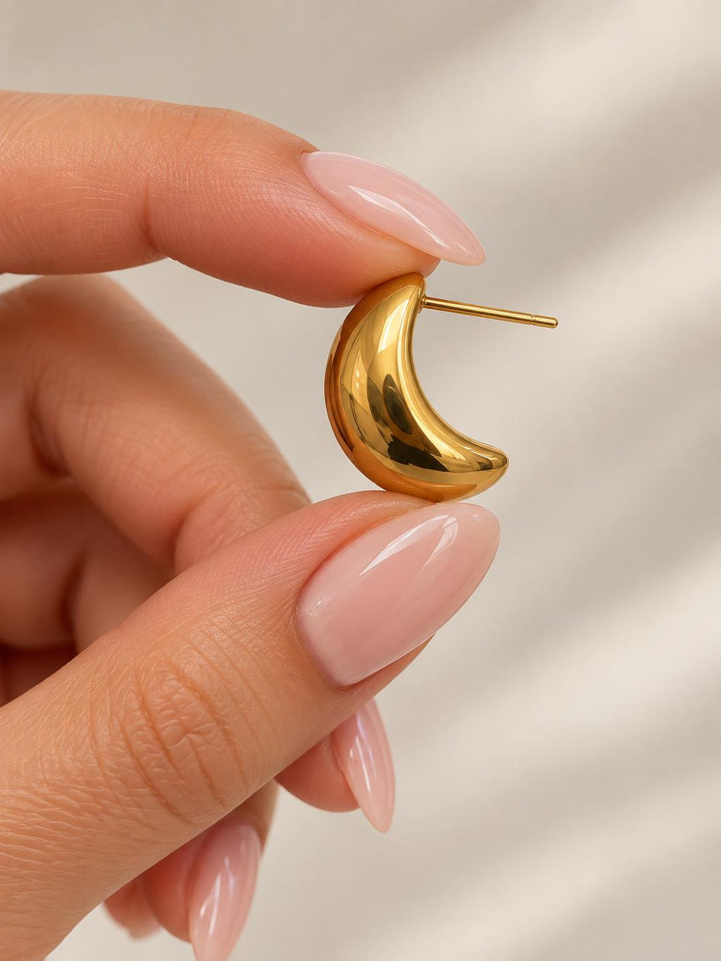 Gold dome huggie teardrop hoop earring with straight post