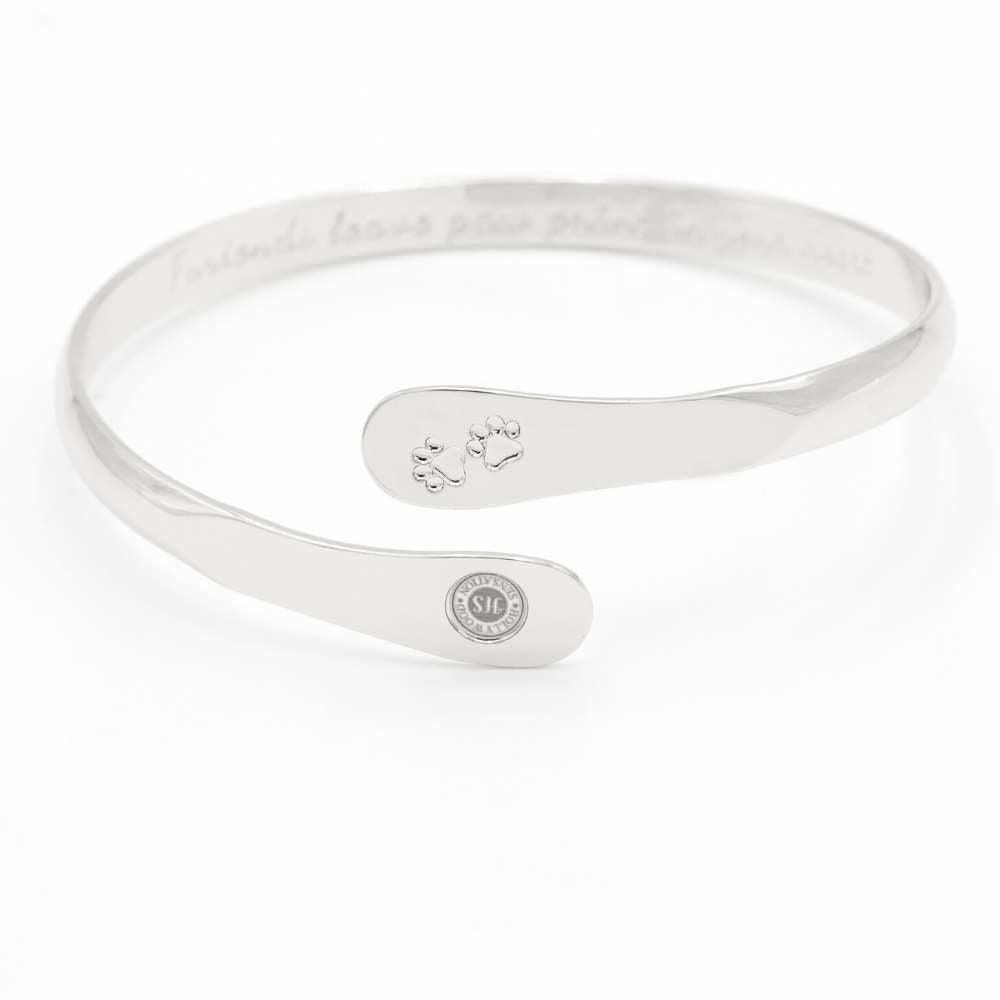 Silver paw print engraved cuff bracelet with small oval logo medallion